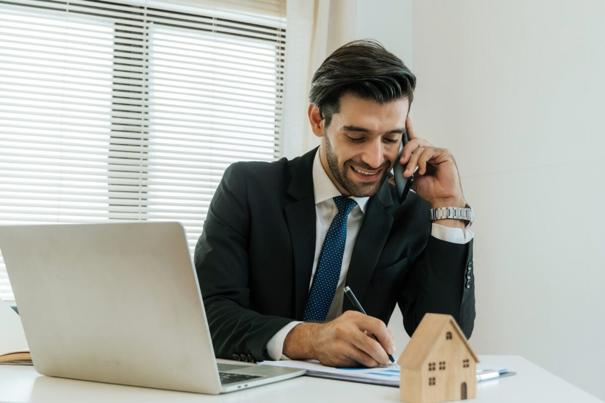 Real estate agent following up with a client through a phone call