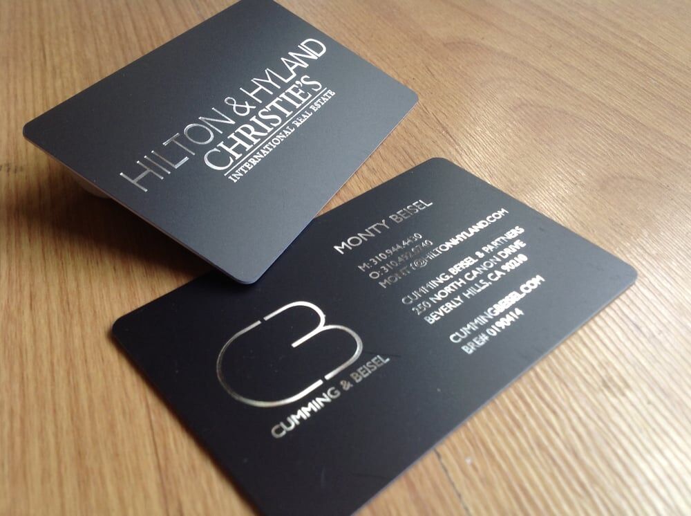 Sophisticated business card in black with chrome foil stamping